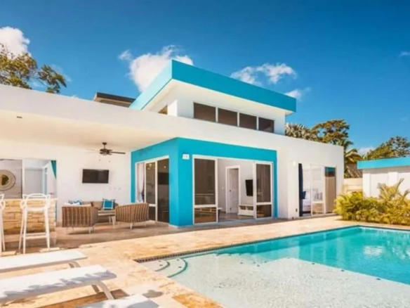 buyDRproperty Modern white and turquoise villa with swimming pool and lounge area Sosua Real Estate
