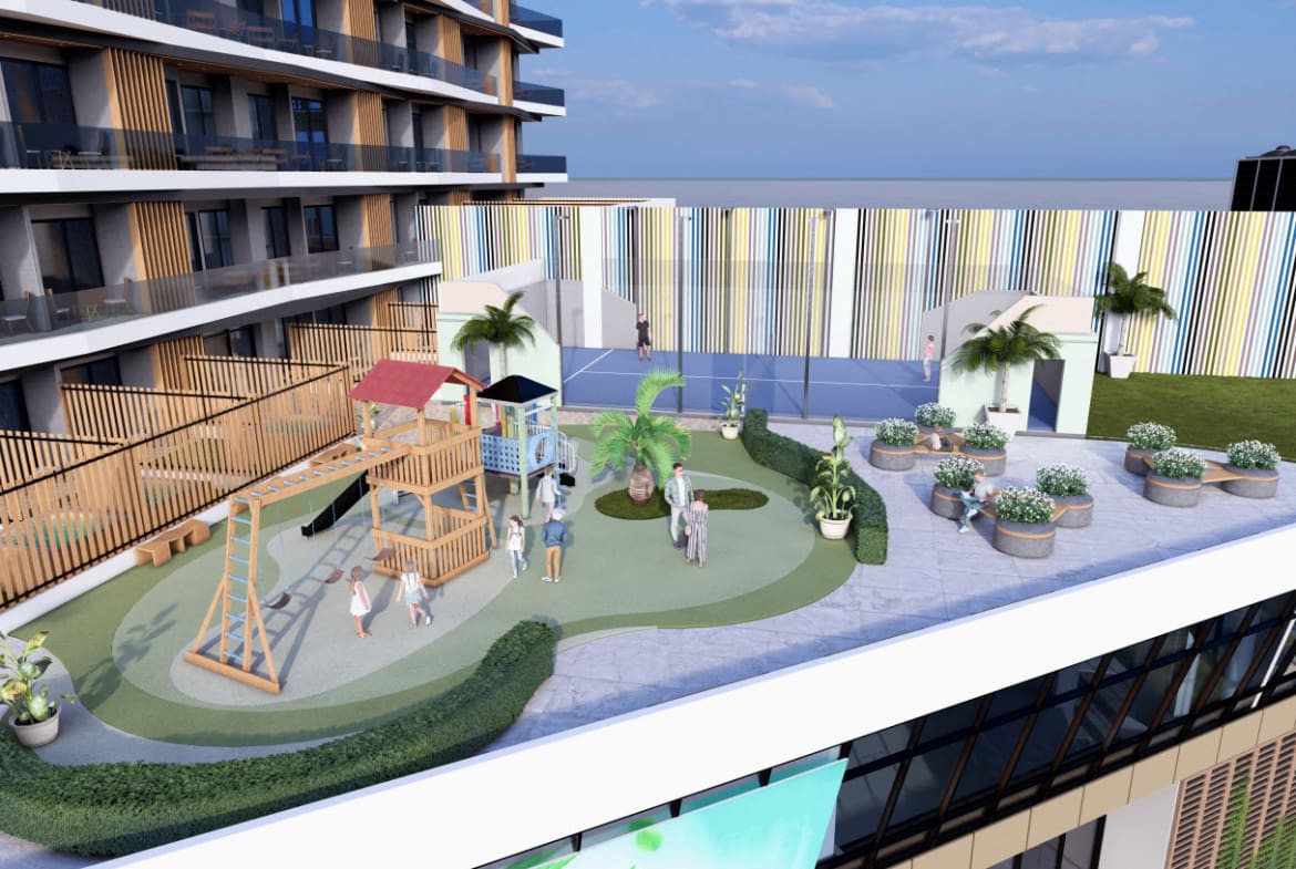 Brickell Center Towers family amenities with playground and sports court in Puerto Plata