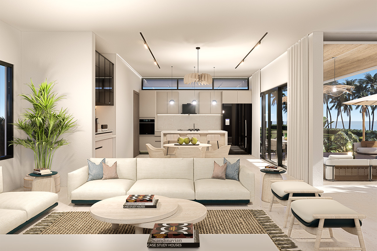Modern living room and kitchen with white sectional sofa, dining table, and ocean view.