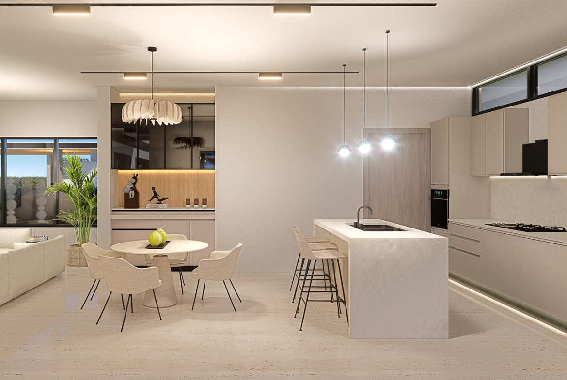 Modern open-plan kitchen and dining area with island and dining table.