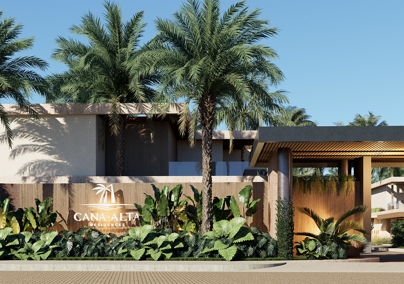 Cana Alta Residences entrance with palm trees and lush landscaping.