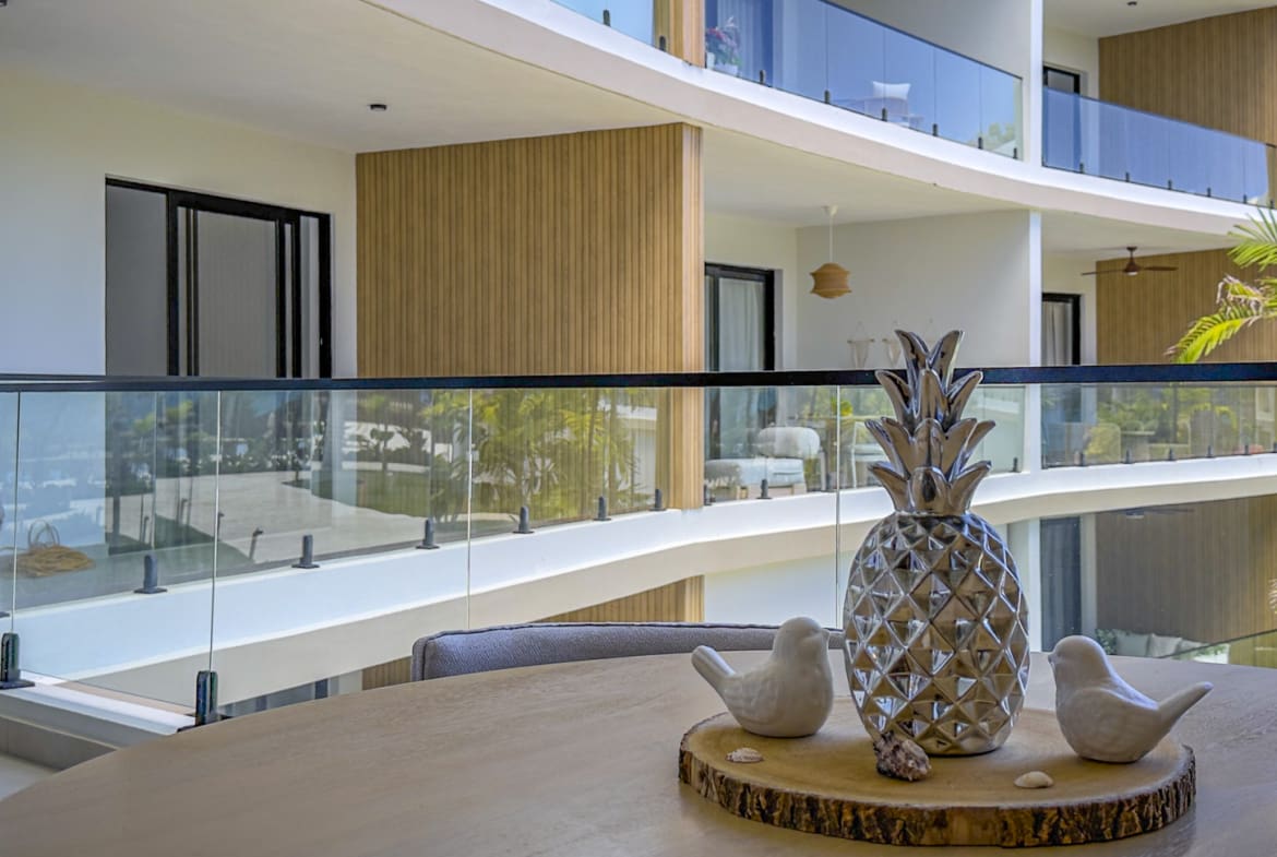 Modern balcony with pineapple decor and ocean view