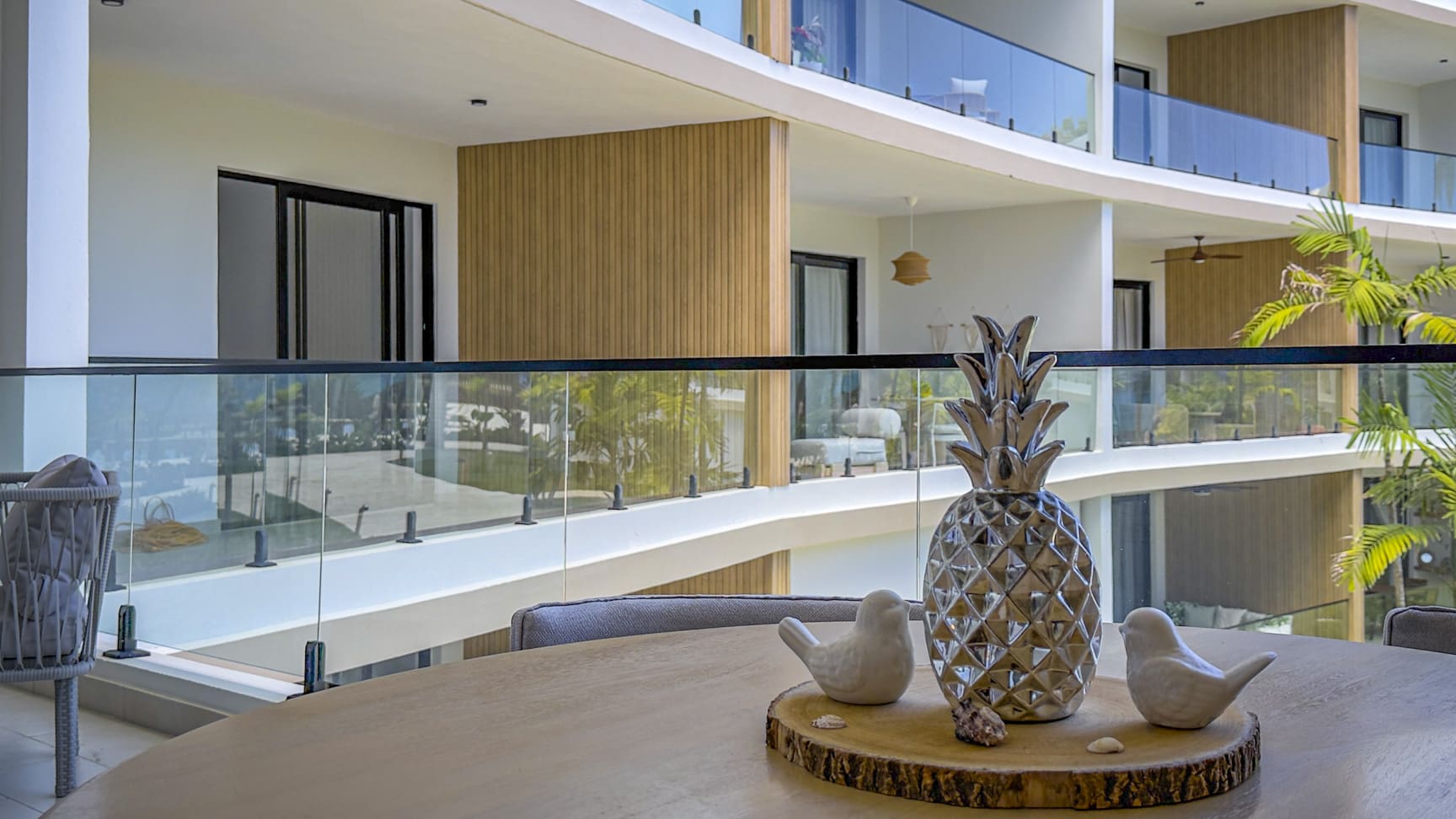 Modern balcony with pineapple decor and ocean view