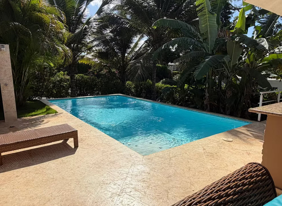 Luxury villa with private pool surrounded by lush tropical foliage