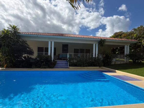 Tropical villa with swimming pool and covered patio